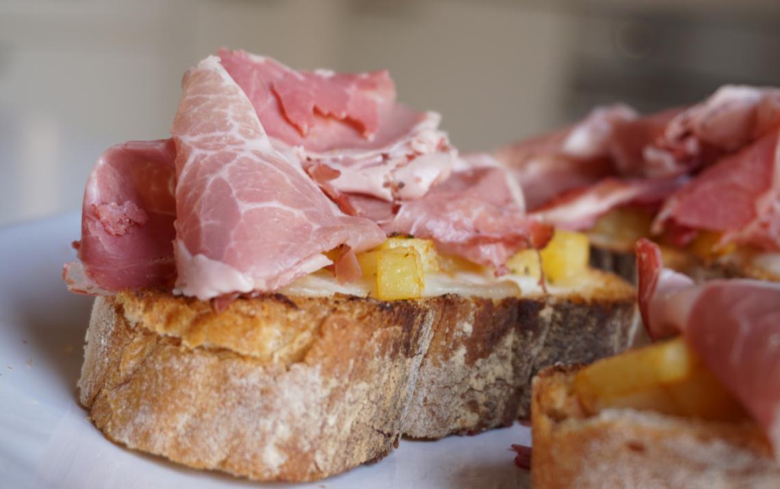 Coppa cooked in wine, Brie and potatoes