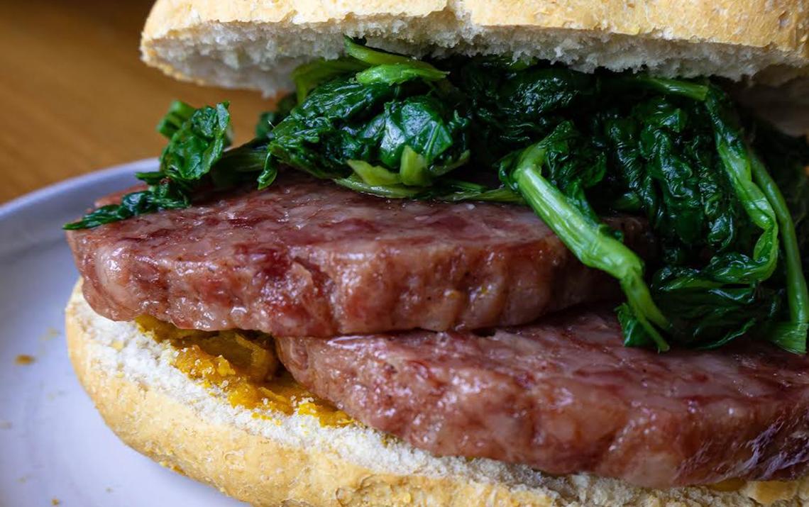 Sandwich with Cotechino and turnip greens